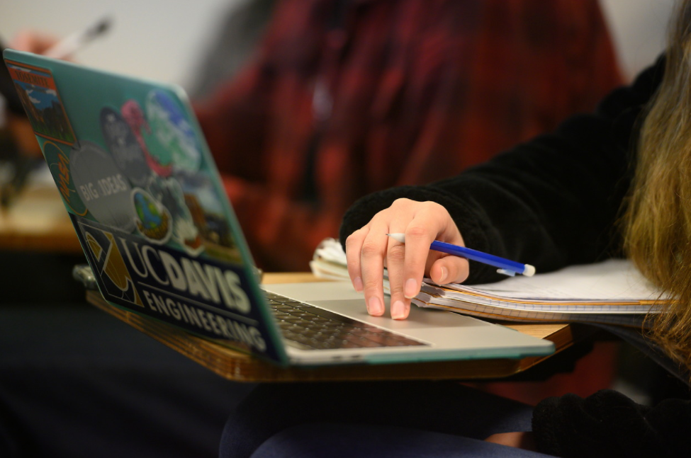 A view of a student's hand on the keyboard of a laptop. Photo by Maureen Kinyua 2020-02-10.