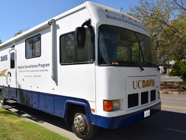 Medical Surveillance Program van displaying the logo on its side