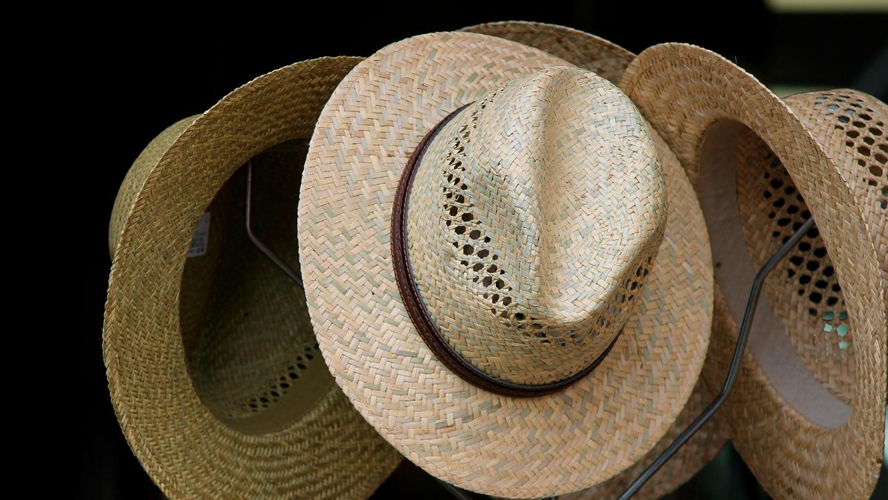 Hat stand with several hats displayed