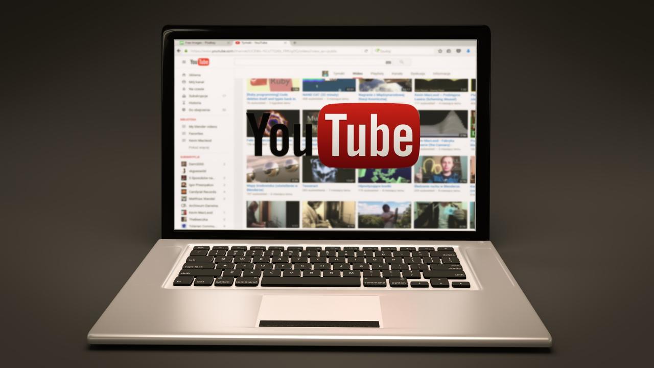 A YouTube channel page displayed on a laptop screen.